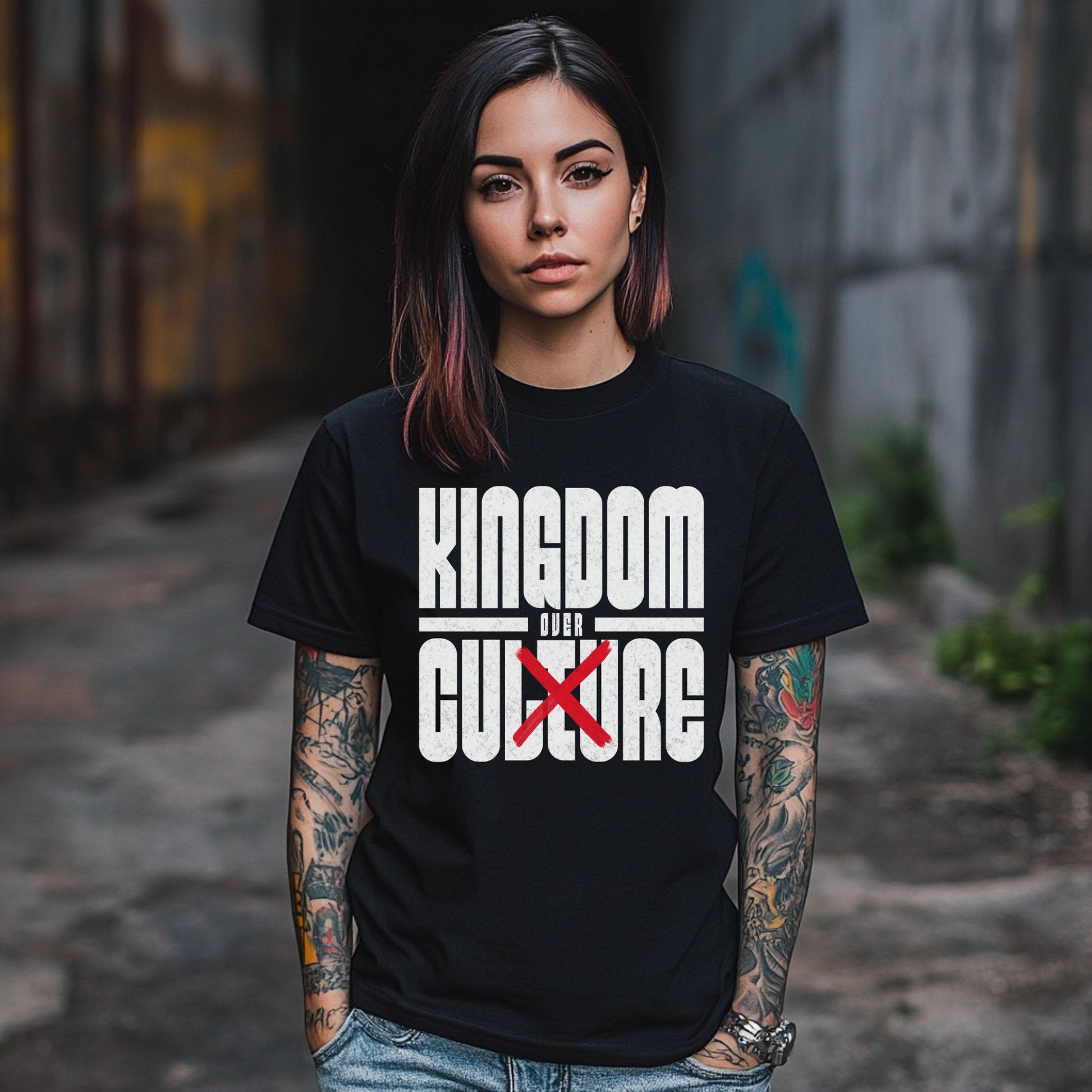 alternative christian woman with tattoos wearing a black short sleeve tshirt from an alternative christian clothing brand