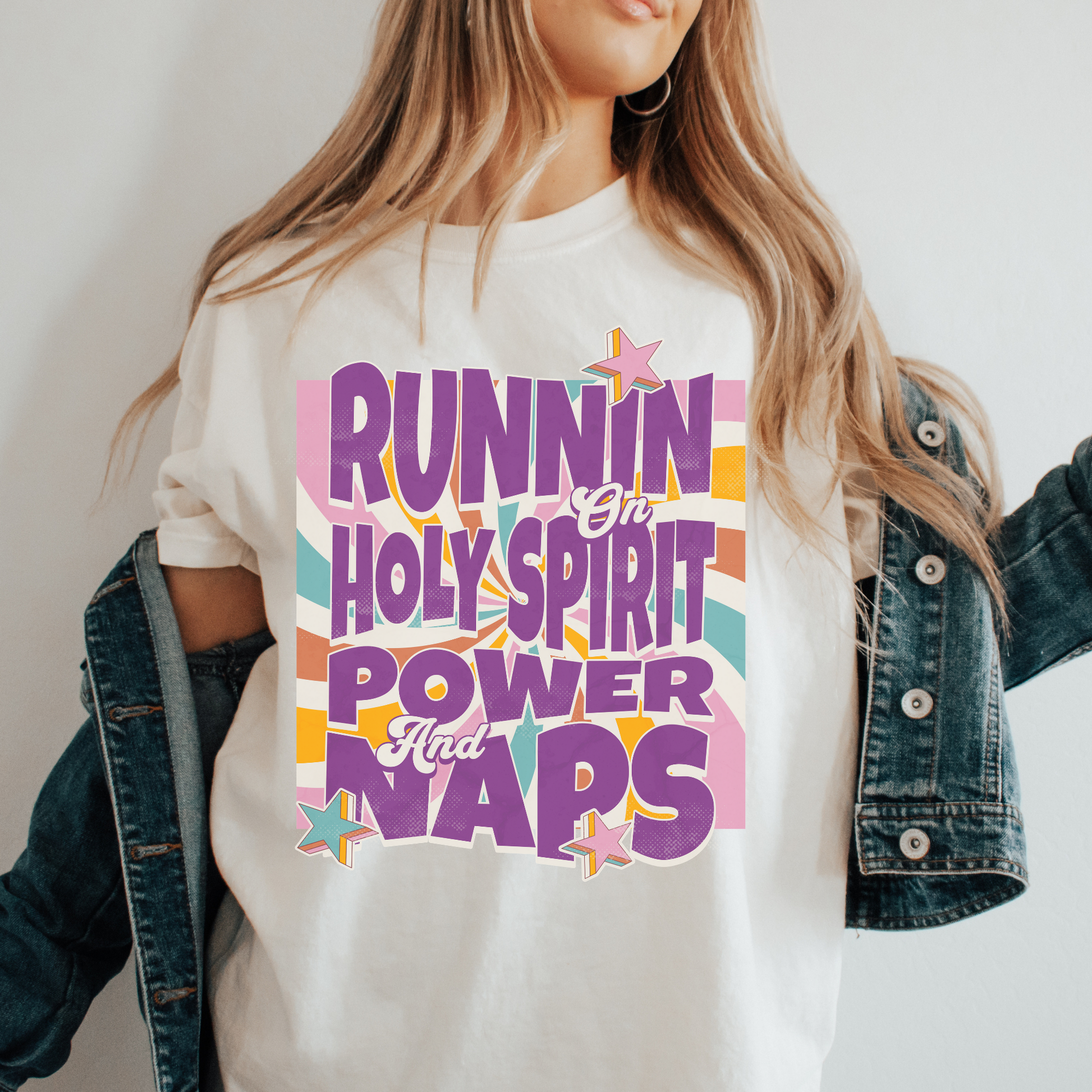 a woman wearing trendy christian apparel with holy spirit quote