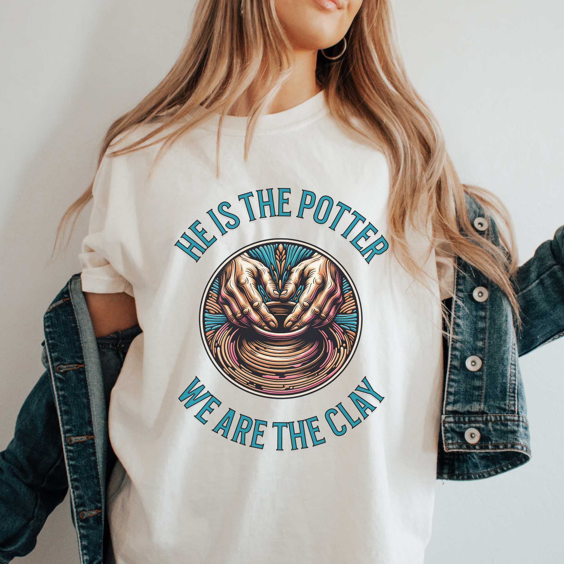 woman wearing a trendy christian tee with scripture on front