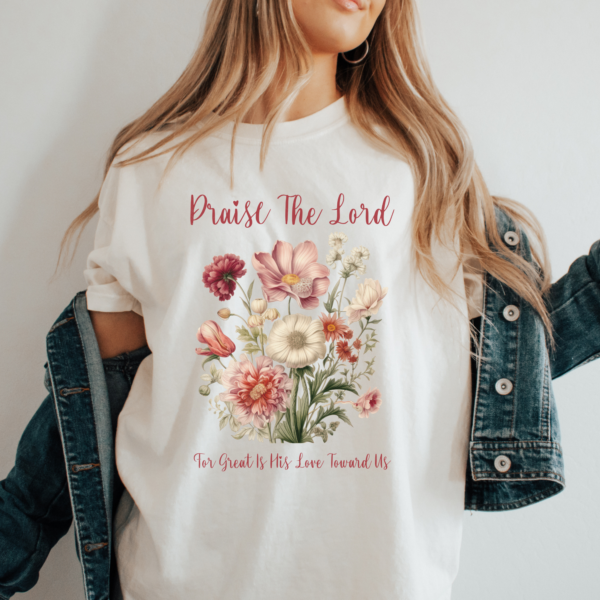 a women wearing a boho christian shirt that says praise the lord for great is his love toward us