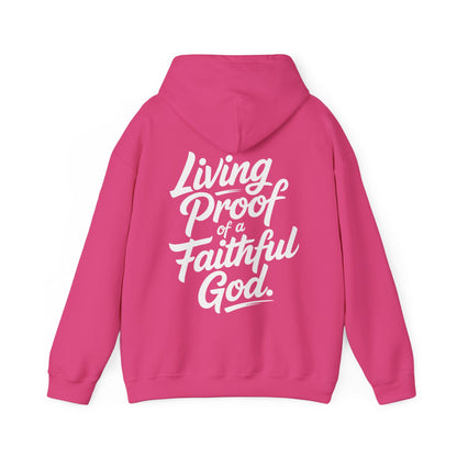 Pink womens faith hoodie with white text 'Living Proof of a Faithful God' on the back against a white background