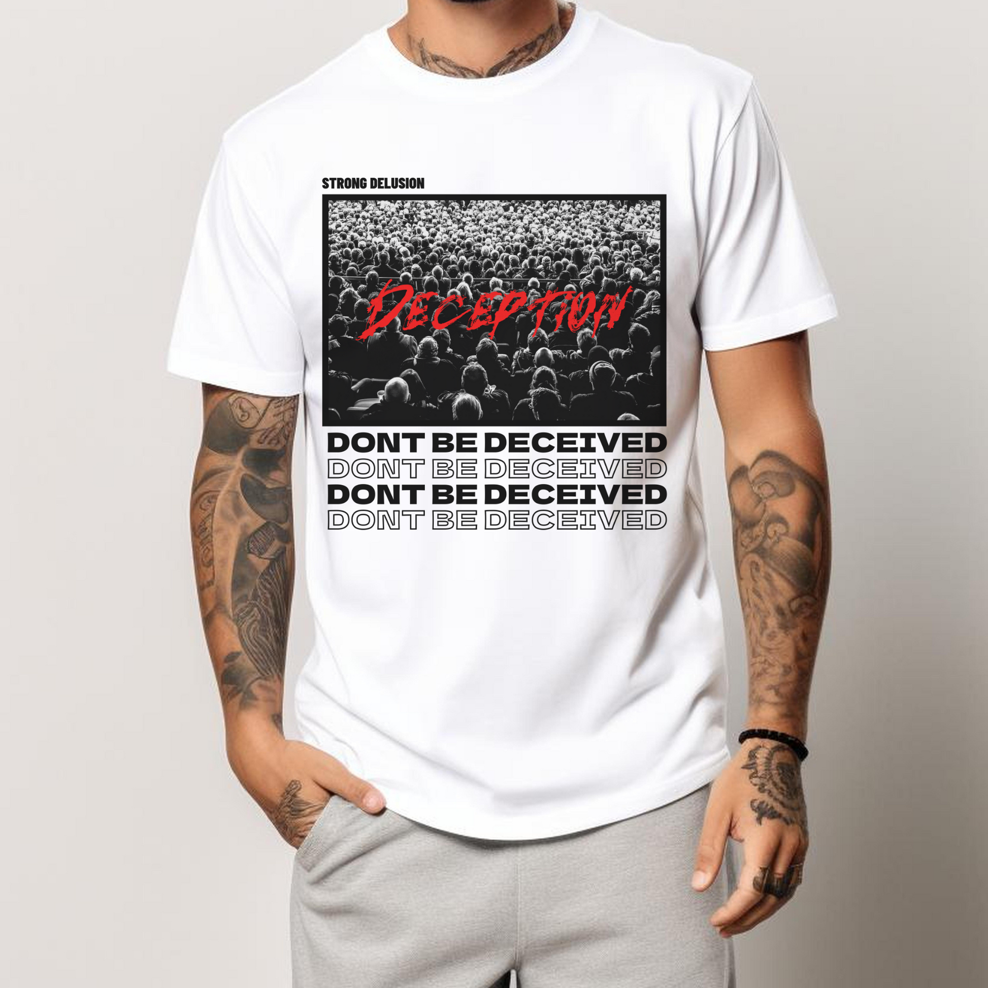 man wearing a white dont be deceived shirt in christian streetwear fashion