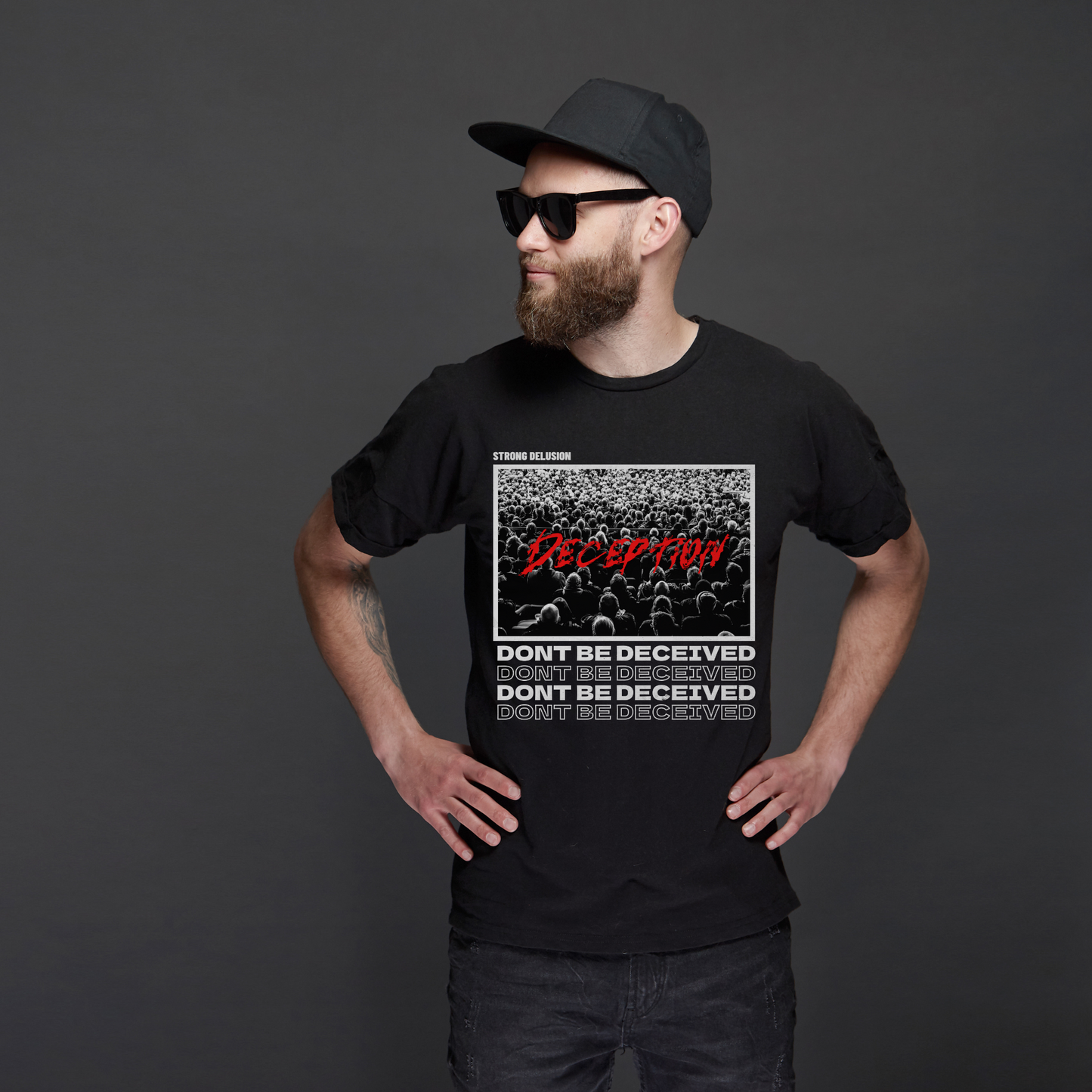 man wearing a black dont be deceived shirt mens christian streetwear brand 