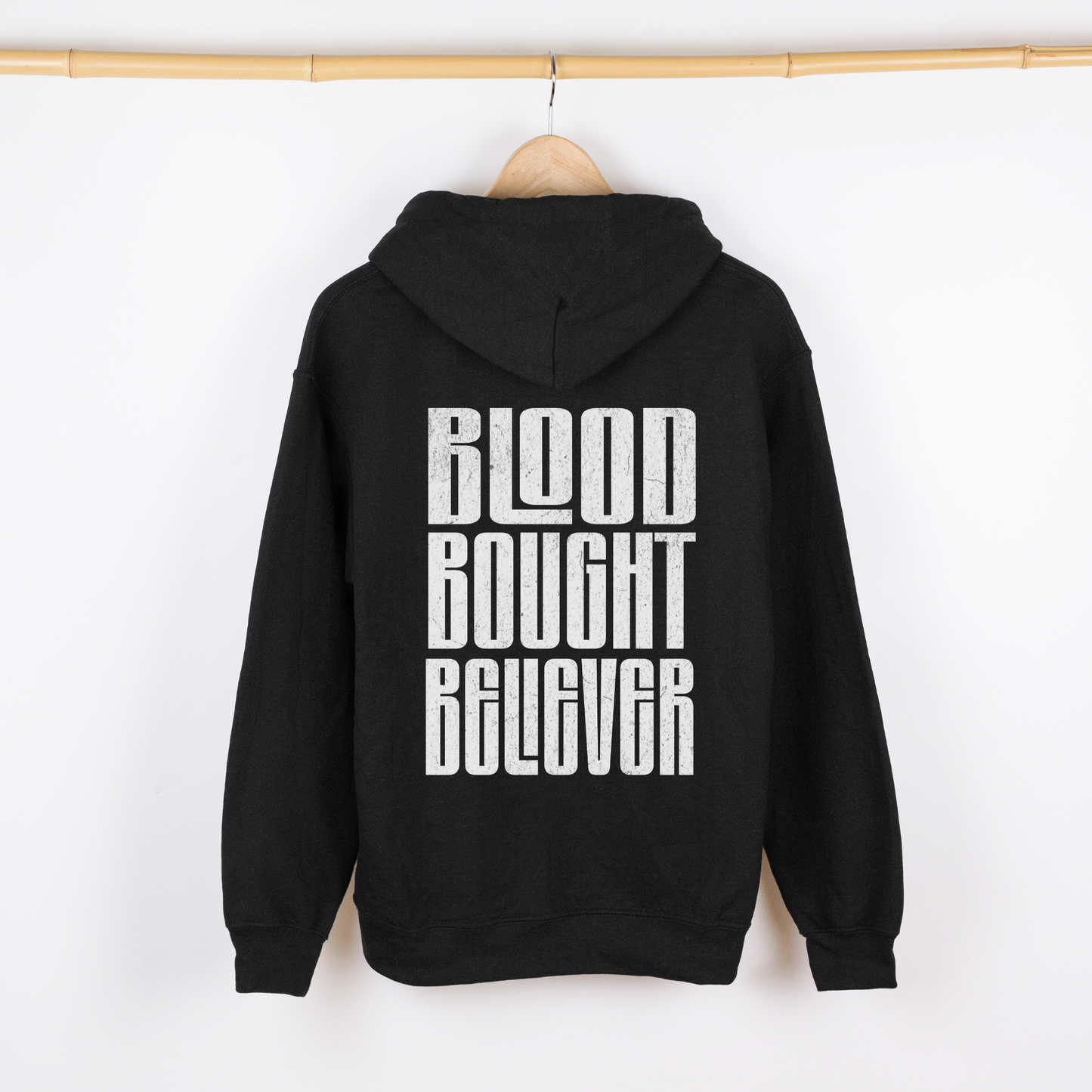 black alternative christian unisex hoodie with back design blood bought believer