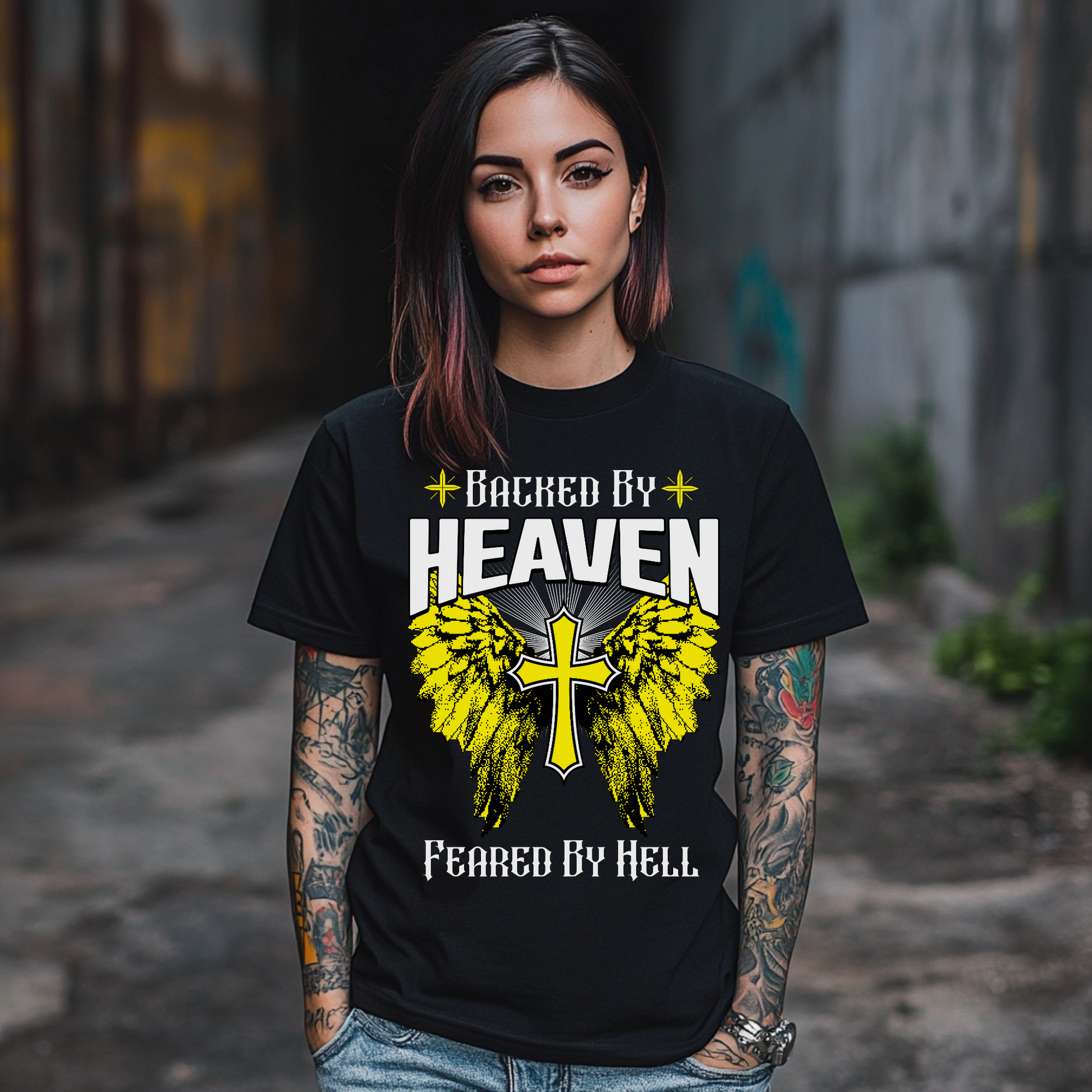 christian alternative clothing, black crewneck short sleeve tshirt, backed by heaven feared by hell, alternative angel wings shirt