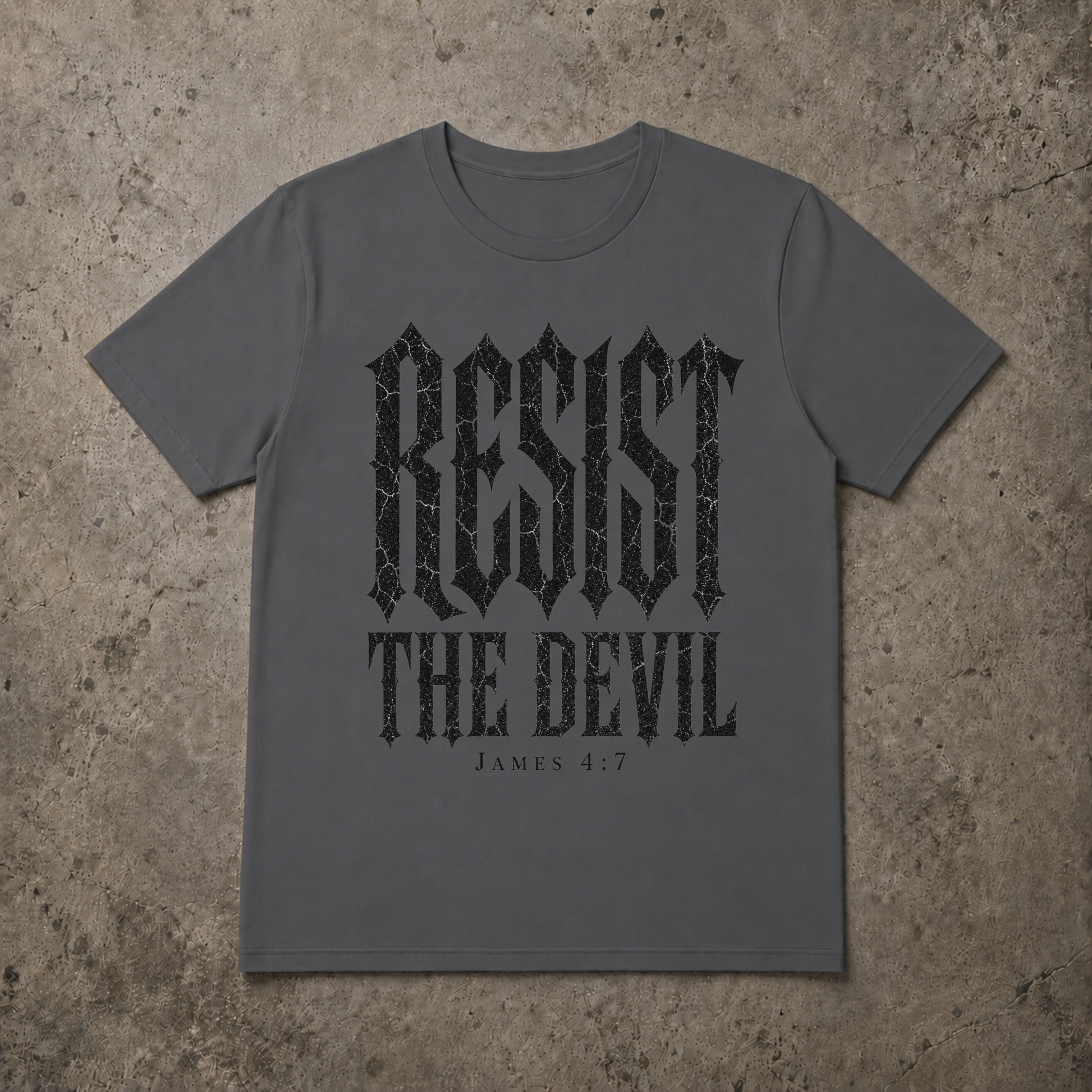 A grey short-sleeve t-shirt with a distressed white graphic print reading 'SET APART' and 'A CHOSEN GENERATION 1 PETER 2:9' underneath, laid flat on a textured gray concrete background.