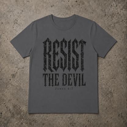 A grey short-sleeve t-shirt with a distressed white graphic print reading 'SET APART' and 'A CHOSEN GENERATION 1 PETER 2:9' underneath, laid flat on a textured gray concrete background.