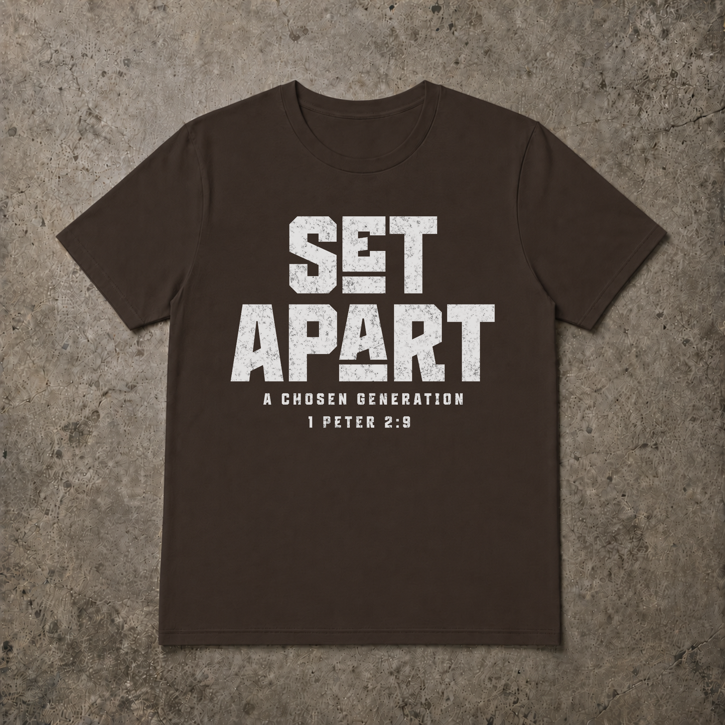 flat lay image of a brown short sleeve christian tshirt that says SET APART in large white text and underneath A Chosen Generation