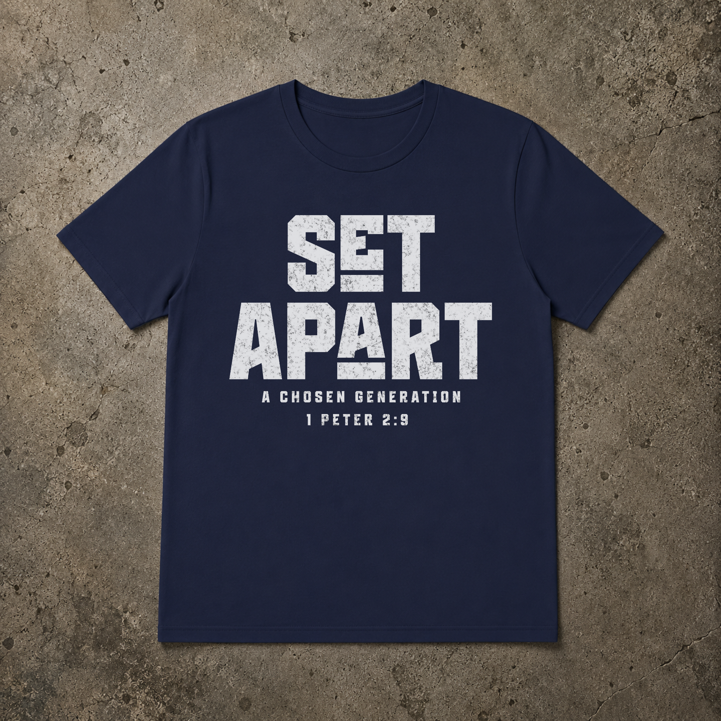 flat lay image of a navy short sleeve tshirt that says SET APART in large white text and underneath A Chosen Generation